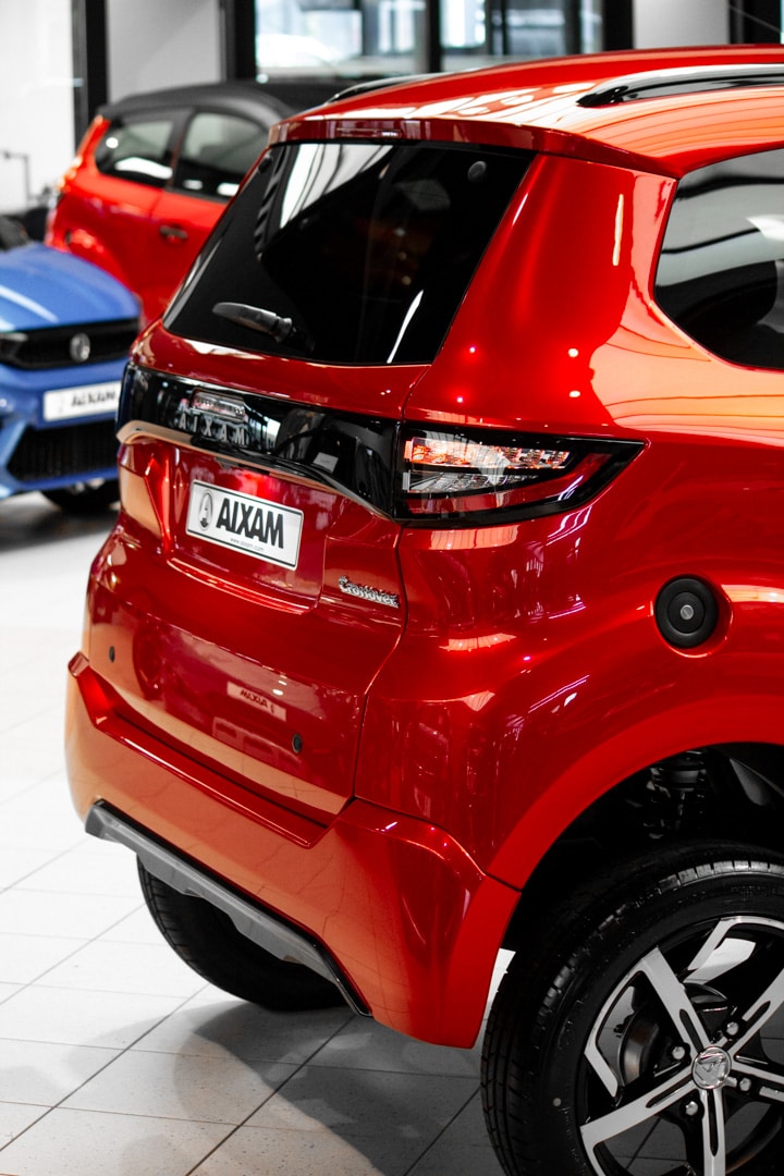 Aixam Crossover Premium Ambition E5 2026 Brommobiel Parelmoerrood Metallic