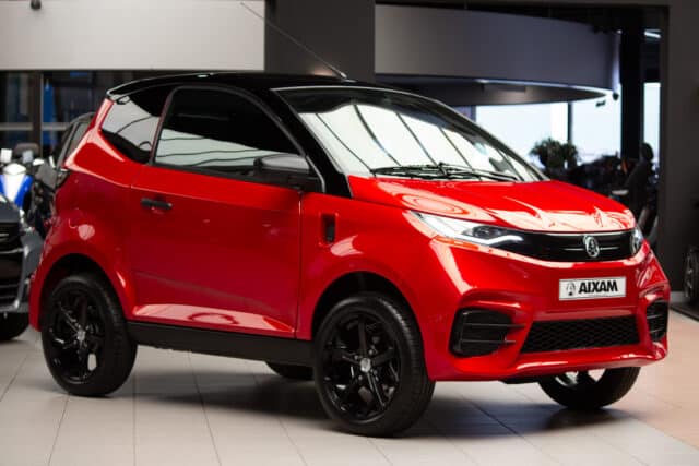 Aixam E City Sport Ambition 2024 Elektrische Brommobiel Occasion Parelmoerrood Metallic